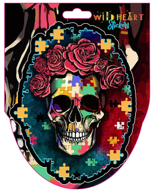 A window sticker featuring a colorful skull with puzzle piece patterns and roses.
