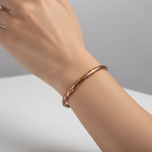Elemental Flow Cuff™ – Tri‑Metal Spiral Bracelet