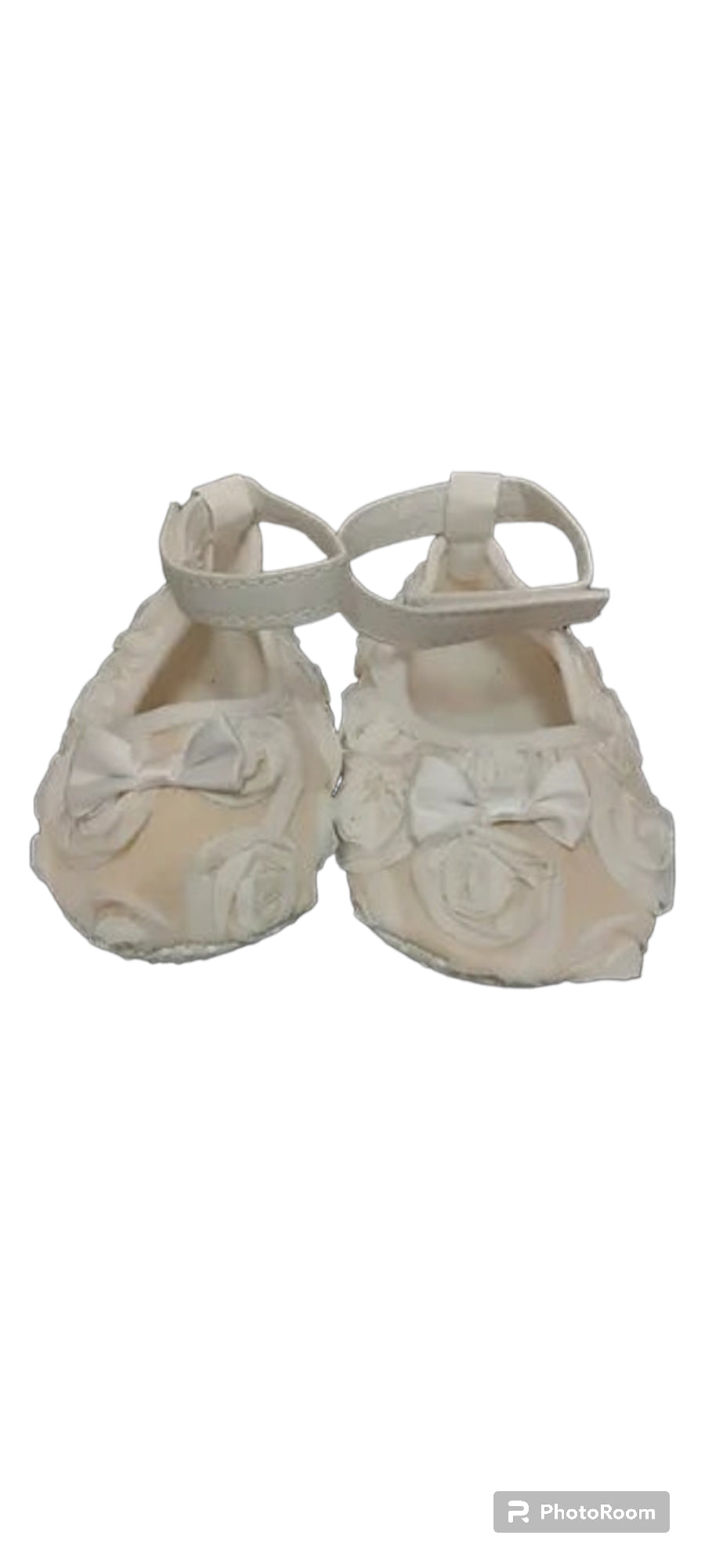 White flower baby shoes